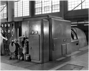 Historical photograph of the newly installed Allis-Chalmers turbine generator. 