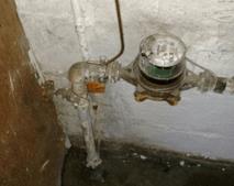 a water service meter in a basement